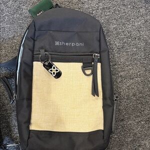 Sherpani Black and Cream Crossbody Bag